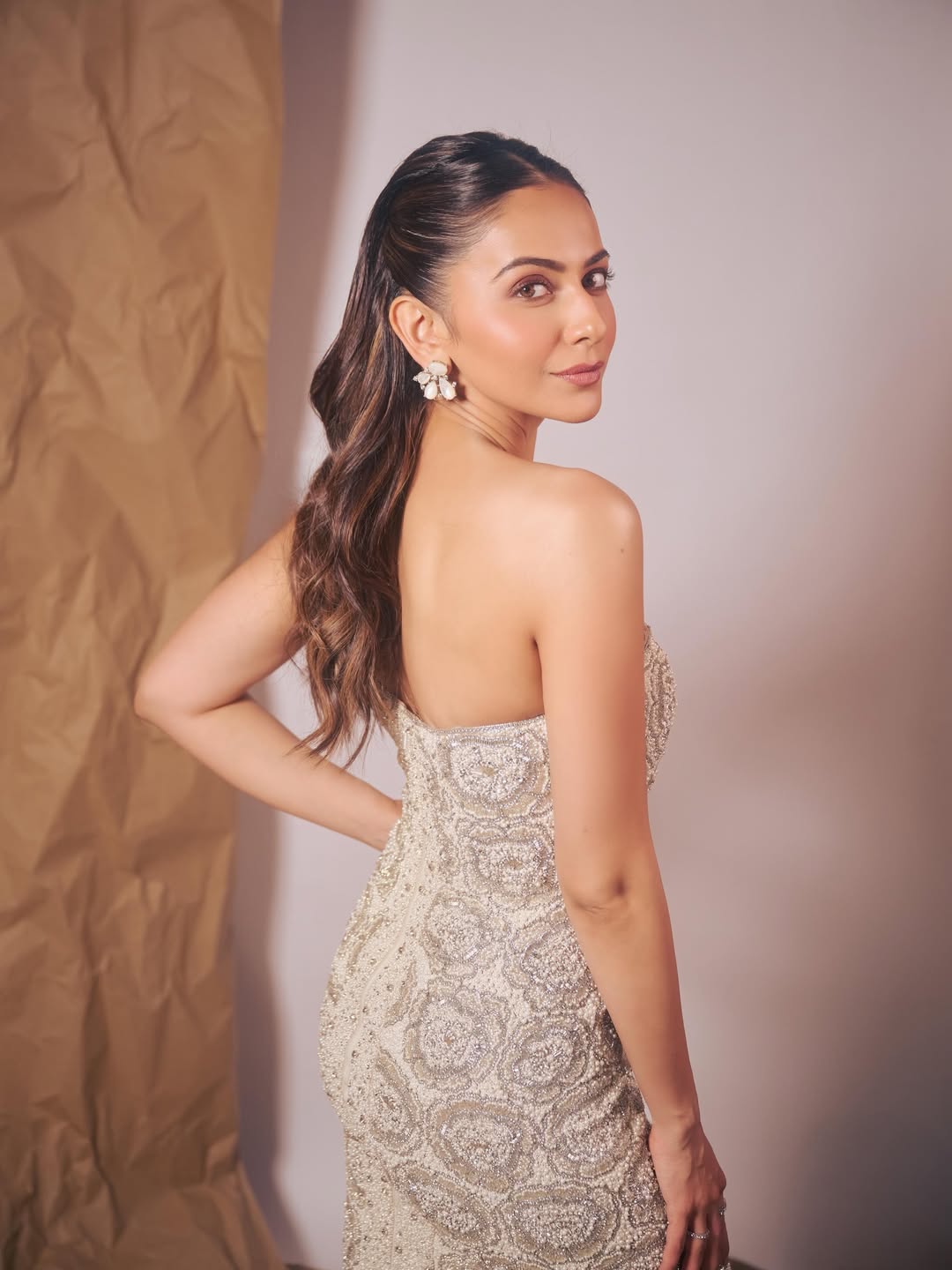 rakul preet singh stuns in minimalist champagne-gold glamour