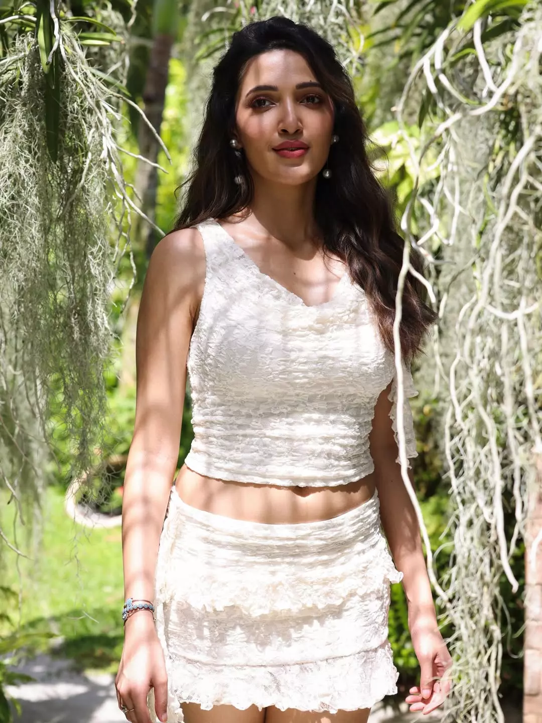 neha shetty shines like a goddess in white lace outfit