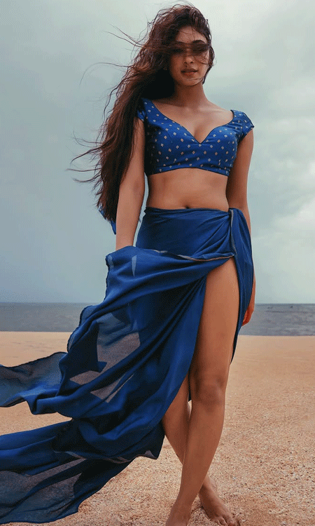 Stunning Beach Frames Capture Anukreethy Vas’s Grace and Charm