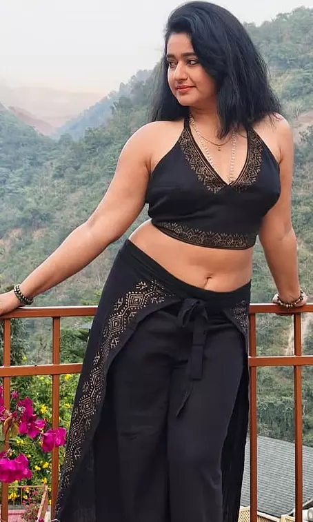 Poonam Bajwa Shines in a Serene Mountain Backdrop