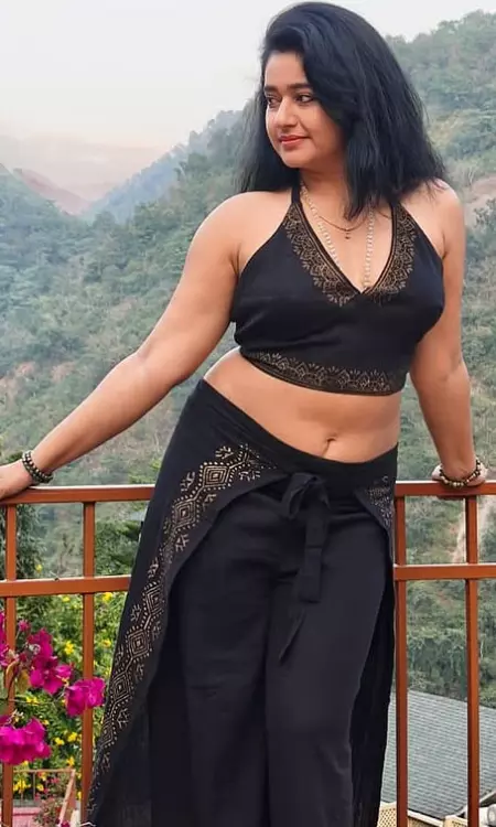 Poonam Bajwa Shines in a Serene Mountain Backdrop