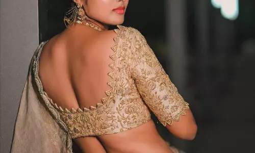 Divi Radiates Elegance in a Timeless Golden Ensemble