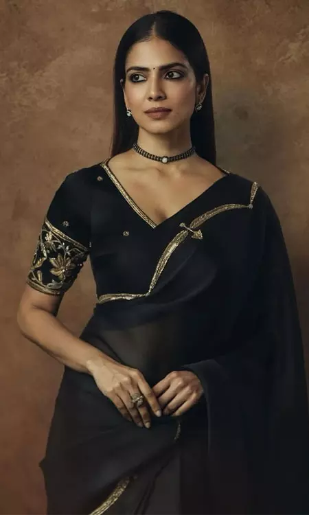 Malavika Mohanan Radiates Beauty in a Chic Black Saree