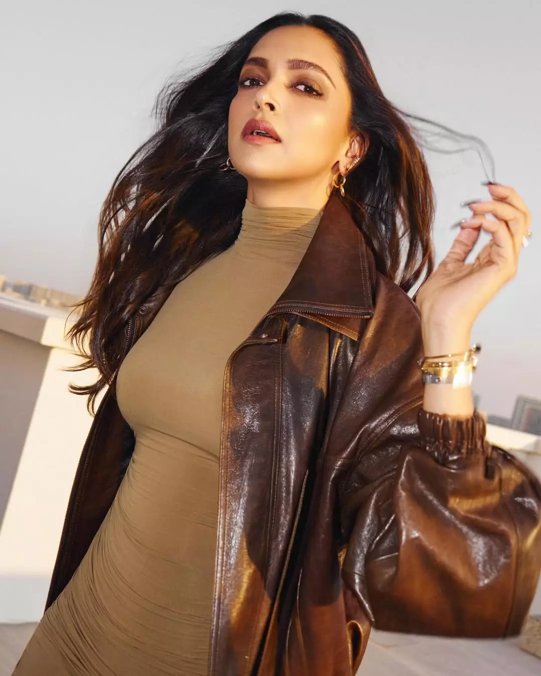 Deepika Padukone Serves Golden-Hour Glam in Chic Camel Bodycon Look Deepika Padukone Serves Golden-Hour Glam in Chic Camel Bodycon Look