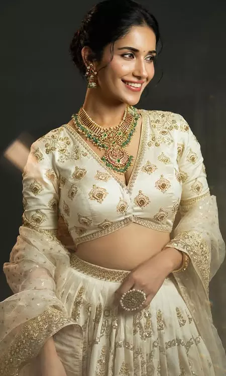 Ruhani Sharma Looks Dreamy in Ivory Bridal Lehenga