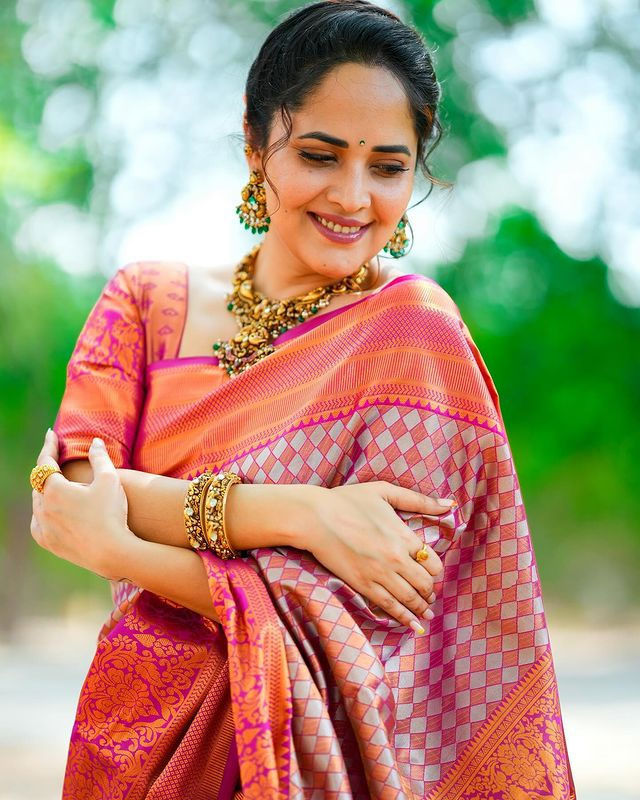 Anasuya in a Graceful Pink Saree Look