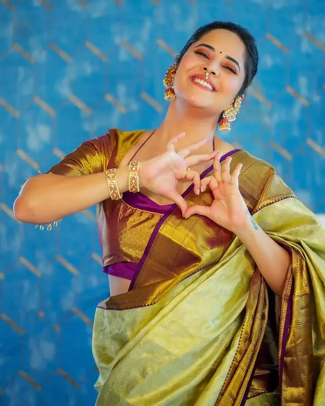 Anasuya in a Graceful Pink Saree Look