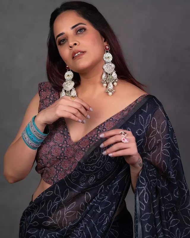 Anasuya in a Graceful Pink Saree Look