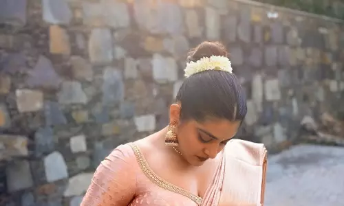 Nivetha Thomas Stuns In Classic Pink Peach Saree