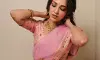 Neha Shetty stuns in soft pink saree, embraces timeless elegance