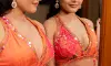 Riddhi Kumar stuns in orange lehenga at the raja saab song launch