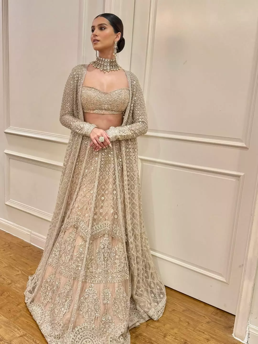 Tara Sutaria Stuns in Champagne Lehenga for Wedding Season Tara Sutaria Stuns in Champagne Lehenga for Wedding Season