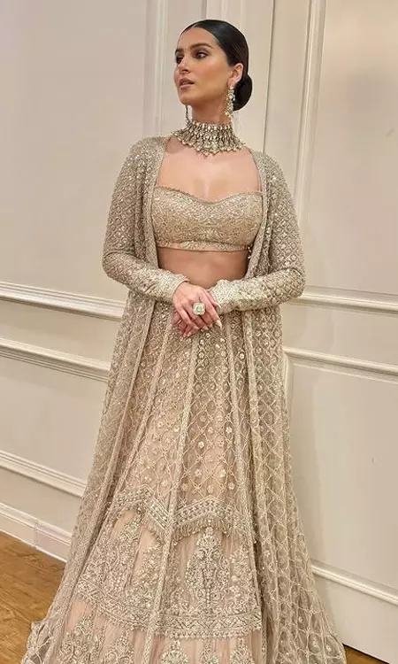 Tara Sutaria Stuns in Champagne Lehenga for Wedding Season