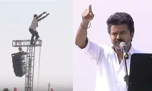 స్తంభం ఎక్కి ముద్దు అడిగిన ఫ్యాన్.. విజయ్  రియాక్షన్  వైరల్!