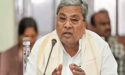 సీఎం కుర్చీ వదలనంతే...కర్ణాటక సీఎం సిద్ధరామయ్య