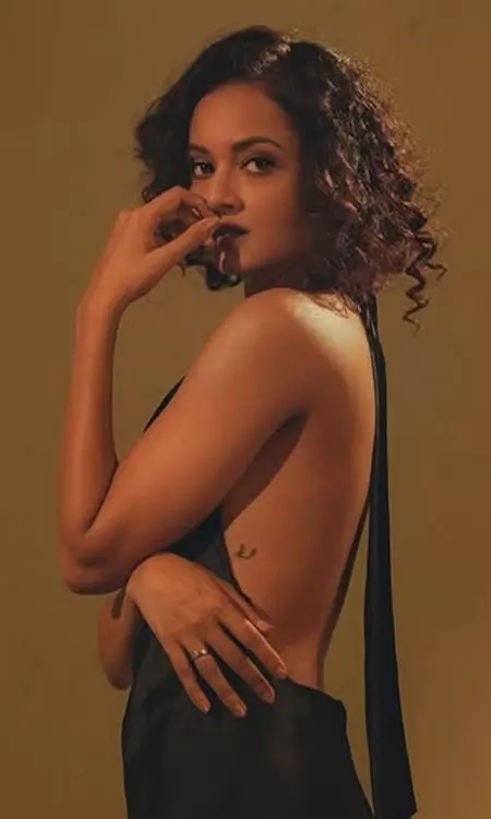 Shanvi Srivastava Stuns in an Elegant Backless Halter-Neck Maxi Dress