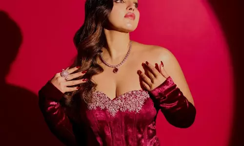 Malavika C Menon’s maroon velvet gown look steals the spotlight