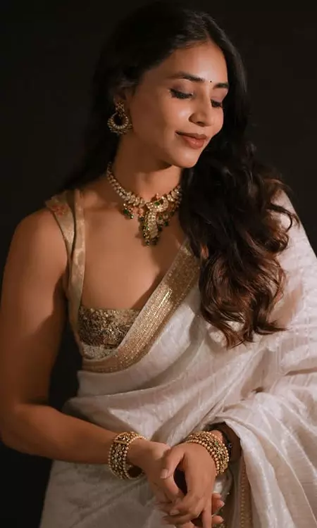 Sapthami Gowda Embraces Timeless Elegance in a Classic White Saree