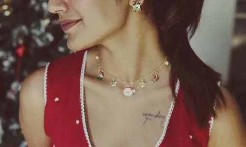 Priya Prakash Varrier Celebrates Christmas in Stunning Red Frock