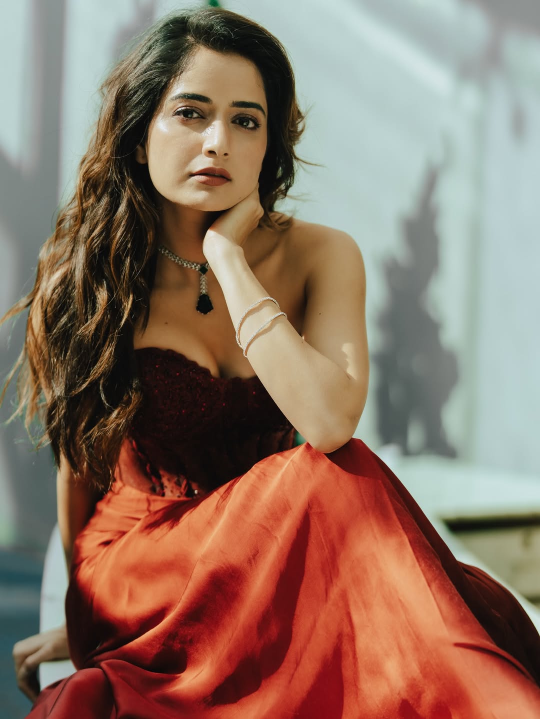 Ashika Ranganath stuns in deep red gown in festive christmas photoshoot |  Ashika Ranganath stuns in deep red gown in festive christmas photoshoot