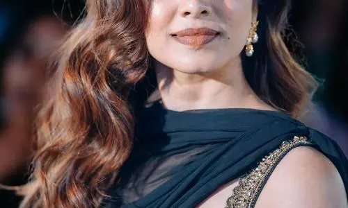 Malavika Mohanan Dazzles with Regal Elegance at Raja Saab Event