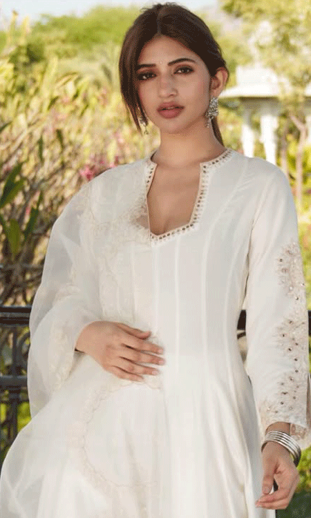 Sreeleela Shares Stylish Snaps In White Traditional Dress