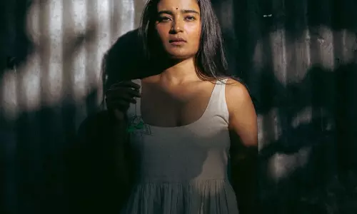 Shadow Game: Chaithra J Achars Enigmatic Glow in Dramatic Light