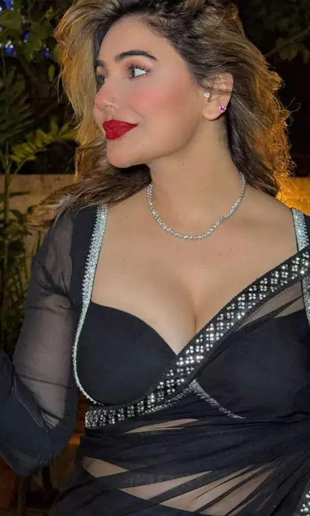 Kangna Sharma Stuns in Sheer Black Saree in Glamorous New Photoshoot