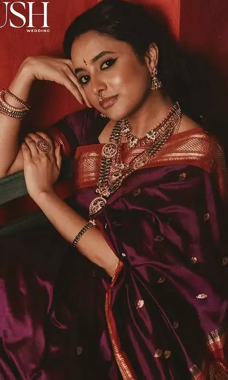 Priyanka Mohan Radiates Bridal Royalty in Maroon Silk Saree