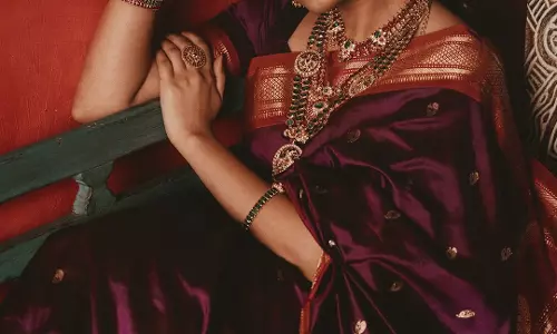 Priyanka Mohan Radiates Bridal Royalty in Maroon Silk Saree