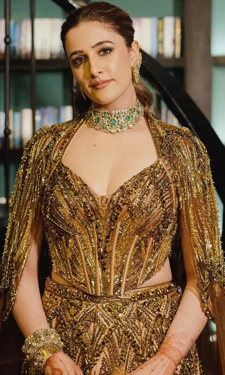 Nupur Sanon Dazzles in Champagne Gold Lehenga at Sangeet Celebration