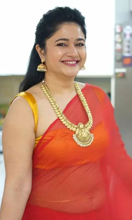 Poonam Bajwas Timeless Red Saree Look