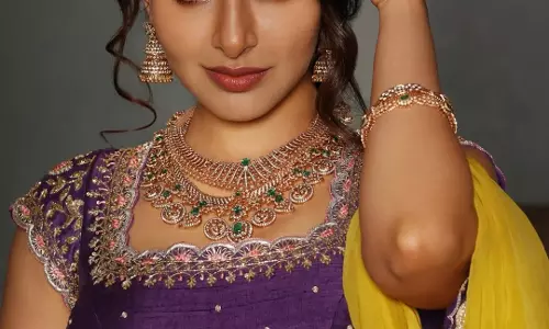 Iswarya Menon Shines in Regal Purple Glory
