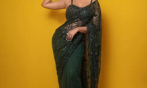 Dimple Hayathi Turns Up the Glam Quotient in Emerald Elegance