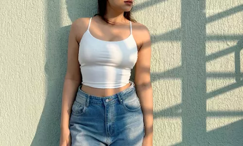 Shraddha Das Stuns in White Crop Top and Blue Jeans Look