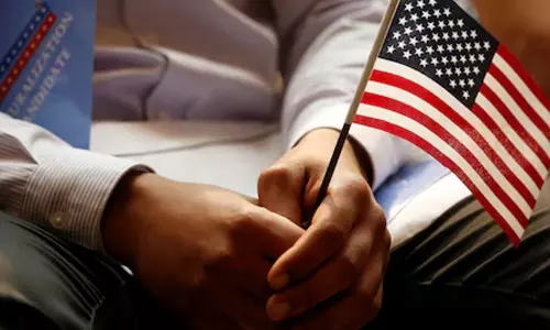 వలసల నియంత్రణ: అమెరికాది ప్రలోభమా? హెచ్చరికా?