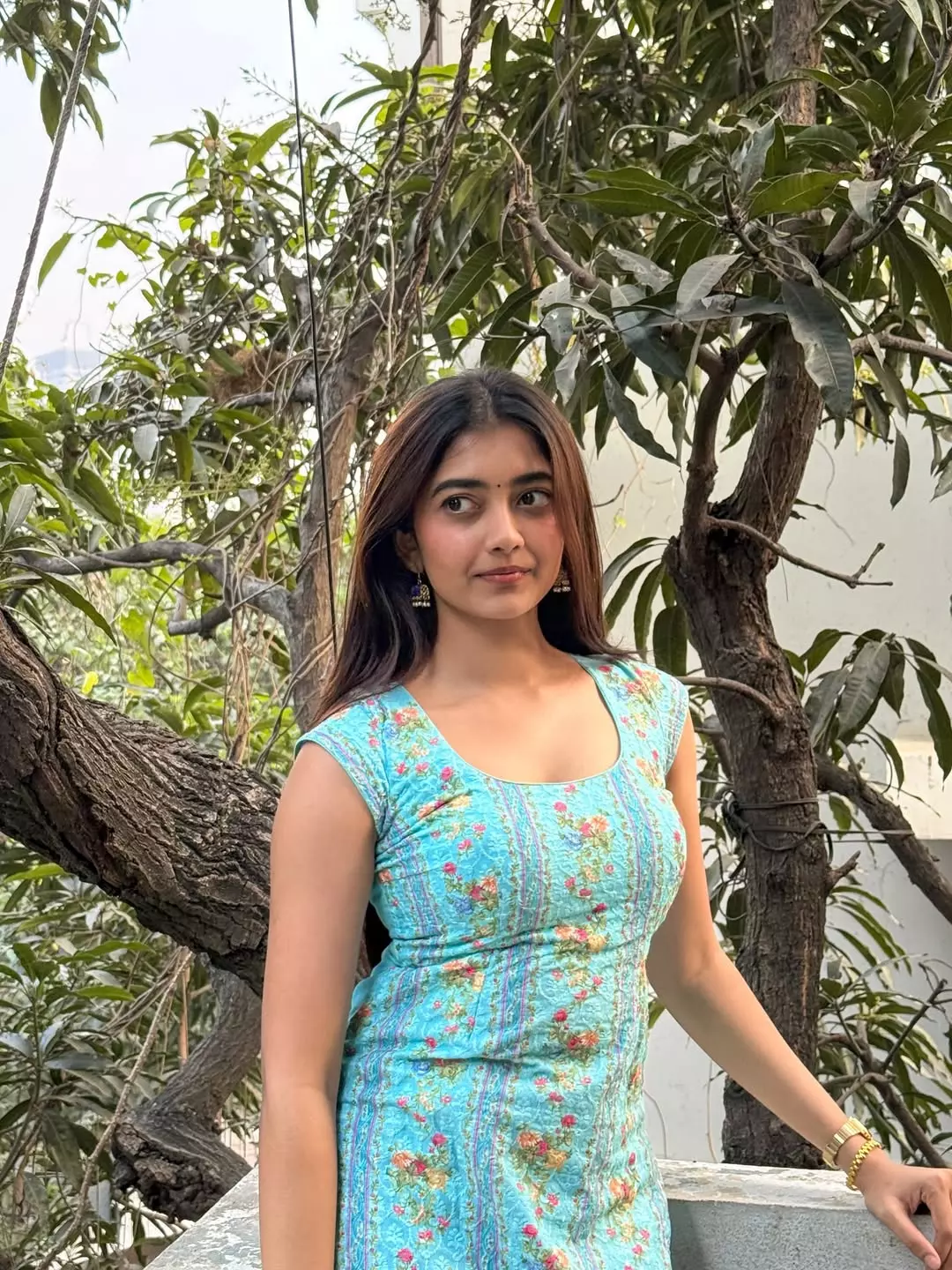 Preethi Pagadala Keeps It Simple With Sky Background Picture