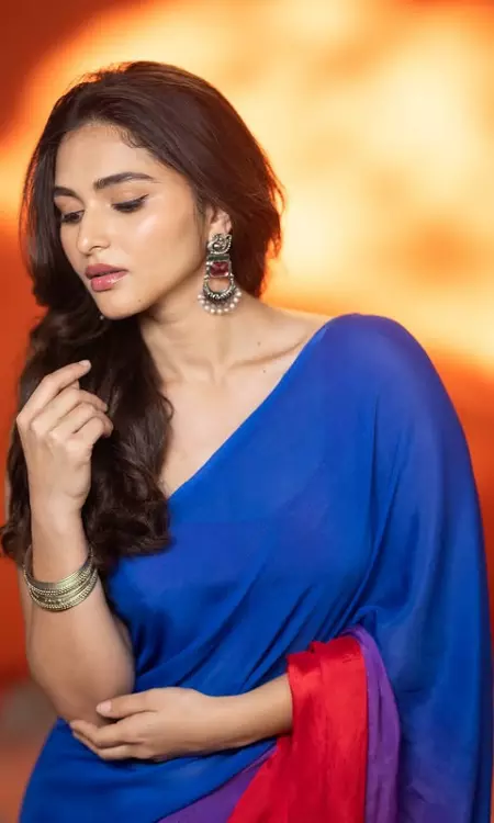 Kayadu Lohar’s Peacock Grace in Blue Elegance