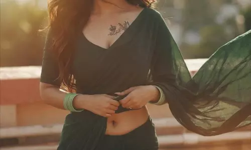 Jyothi Rai Stuns in Traditional Green Saree