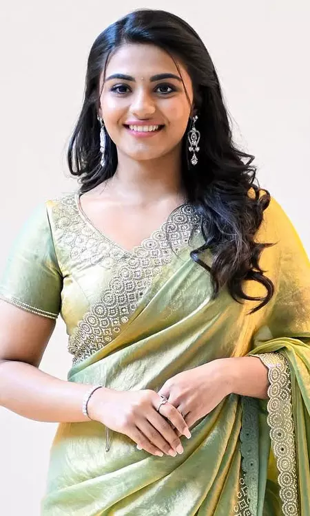 Nayan Sarika Stuns in Lime-Green Silk Saree Photoshoot