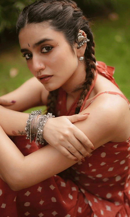 Ladybug Charm: Priya Prakash Varriers Polka-Dot Elegance