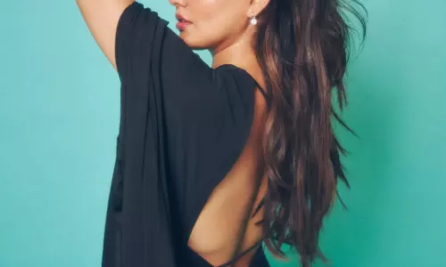 Neha Sharma Stuns in Sultry Black Backless Look