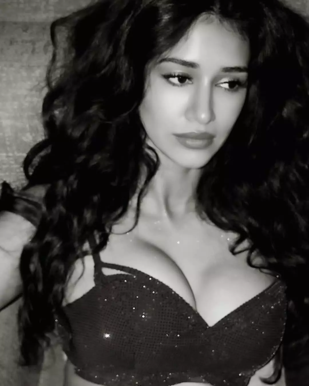 Disha Patani Stuns in Orange Lehenga: Regal & Glamorous Photoshoot