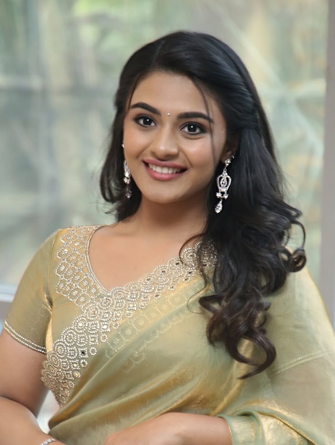 Nayan Sarika Radiates Elegance In Golden-Green Saree Nayan Sarika Radiates Elegance In Golden-Green Saree