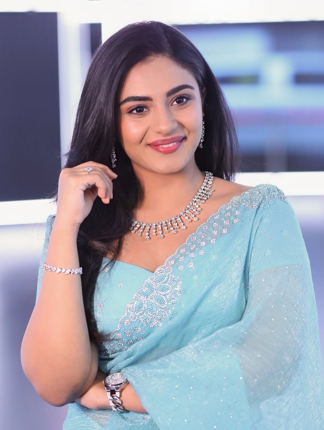 Nayan Sarika Radiates Elegance In Golden-Green Saree