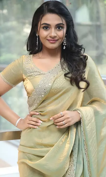 Nayan Sarika Radiates Elegance In Golden-Green Saree