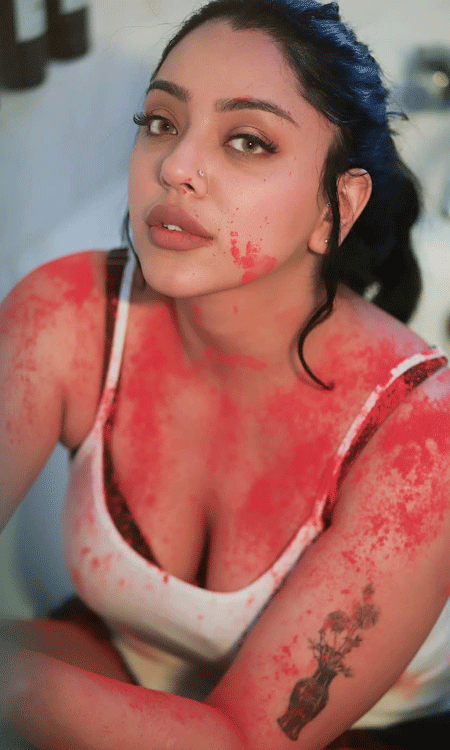 Deviyani Sharma’s Powerful Holi Look drenched in red radiates raw emotion