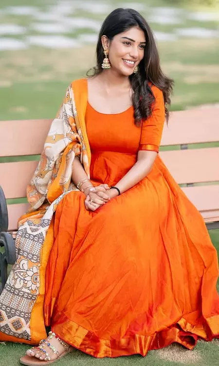 Supritha Shares Elegant Photos in Orange Dress