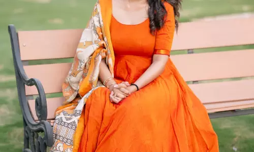 Supritha Shares Elegant Photos in Orange Dress