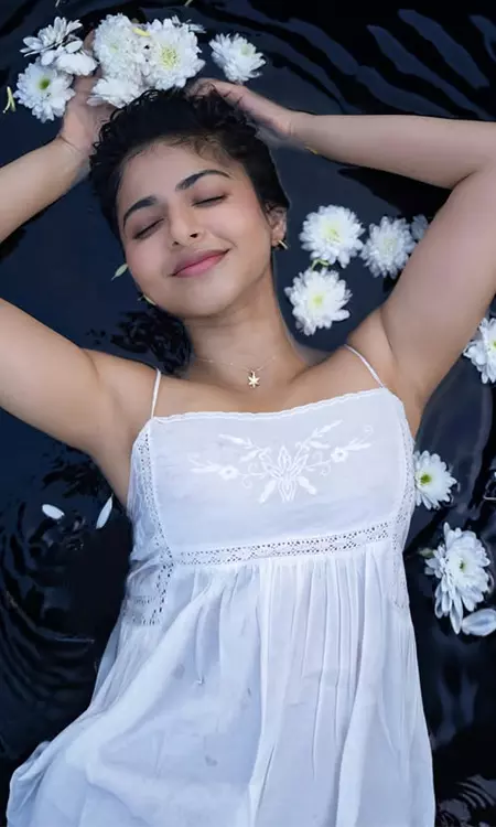 Iswarya Menon Mesmerizes in Ethereal White Photoshoot